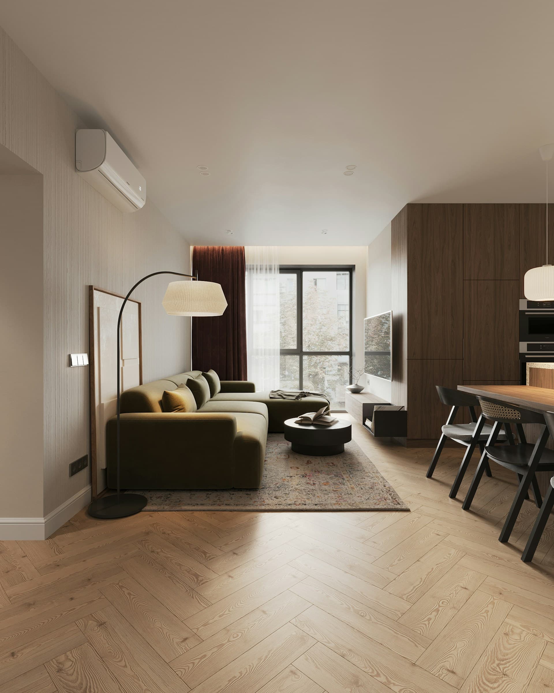 Open living space with warm oak flooring