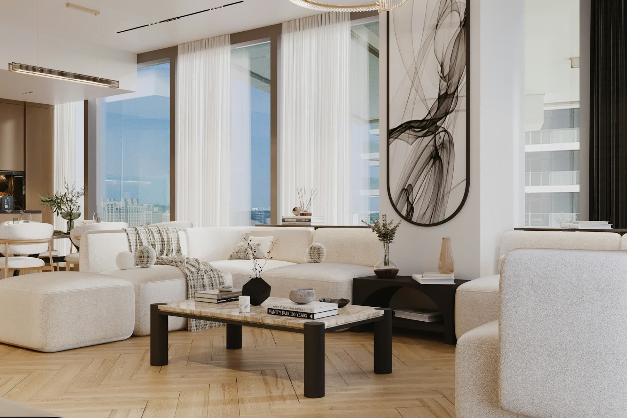 Bright living room with ivory bouclé sofas and an ink-wash artwork