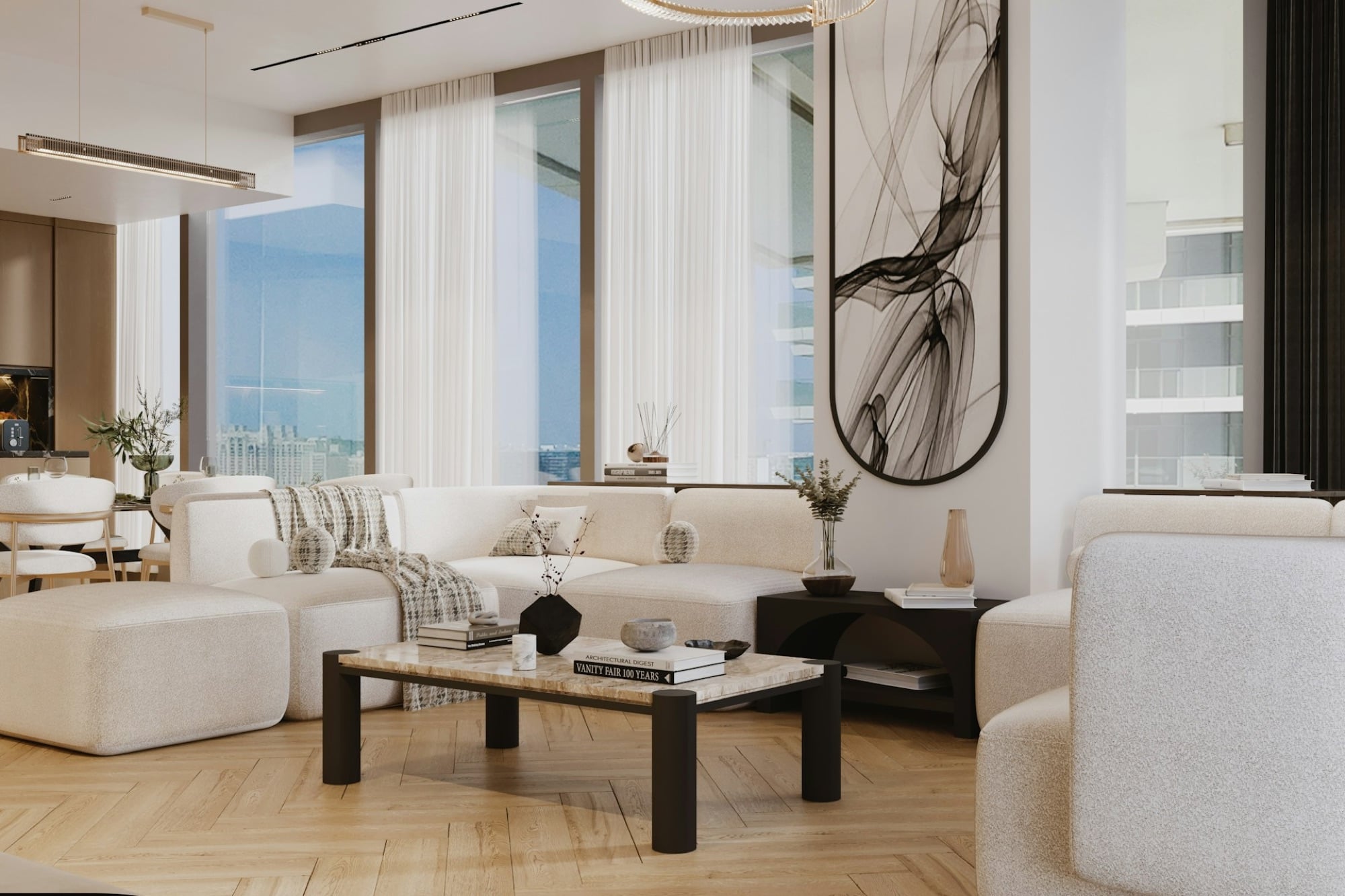 Bright living room with ivory bouclé sofas and an ink-wash artwork