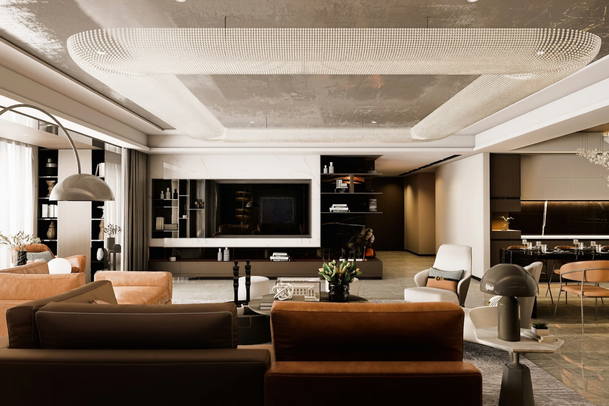 Grand living room with cognac leather sofas beneath a sculpted ceiling