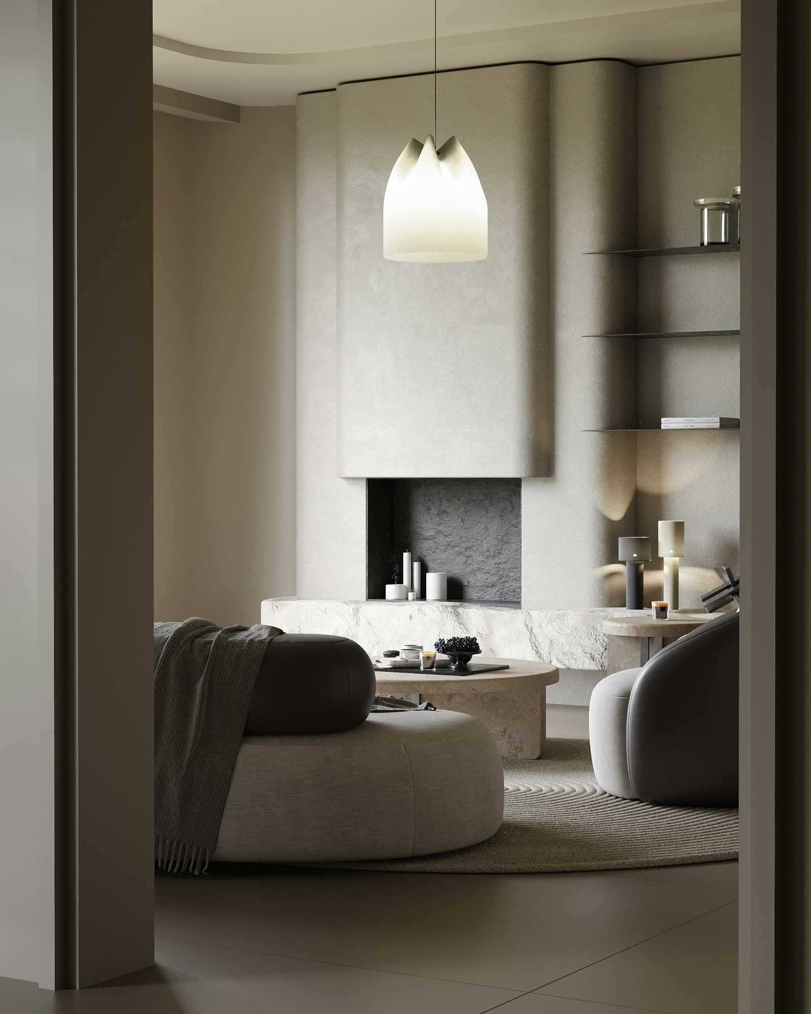 Living room seen through a doorway with a curved sofa